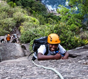 A CEU student climbing Sugarloaf Peak outside Rio.